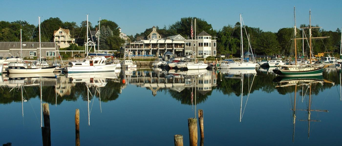 A view of buildings on the water and boats in Kennebunkport